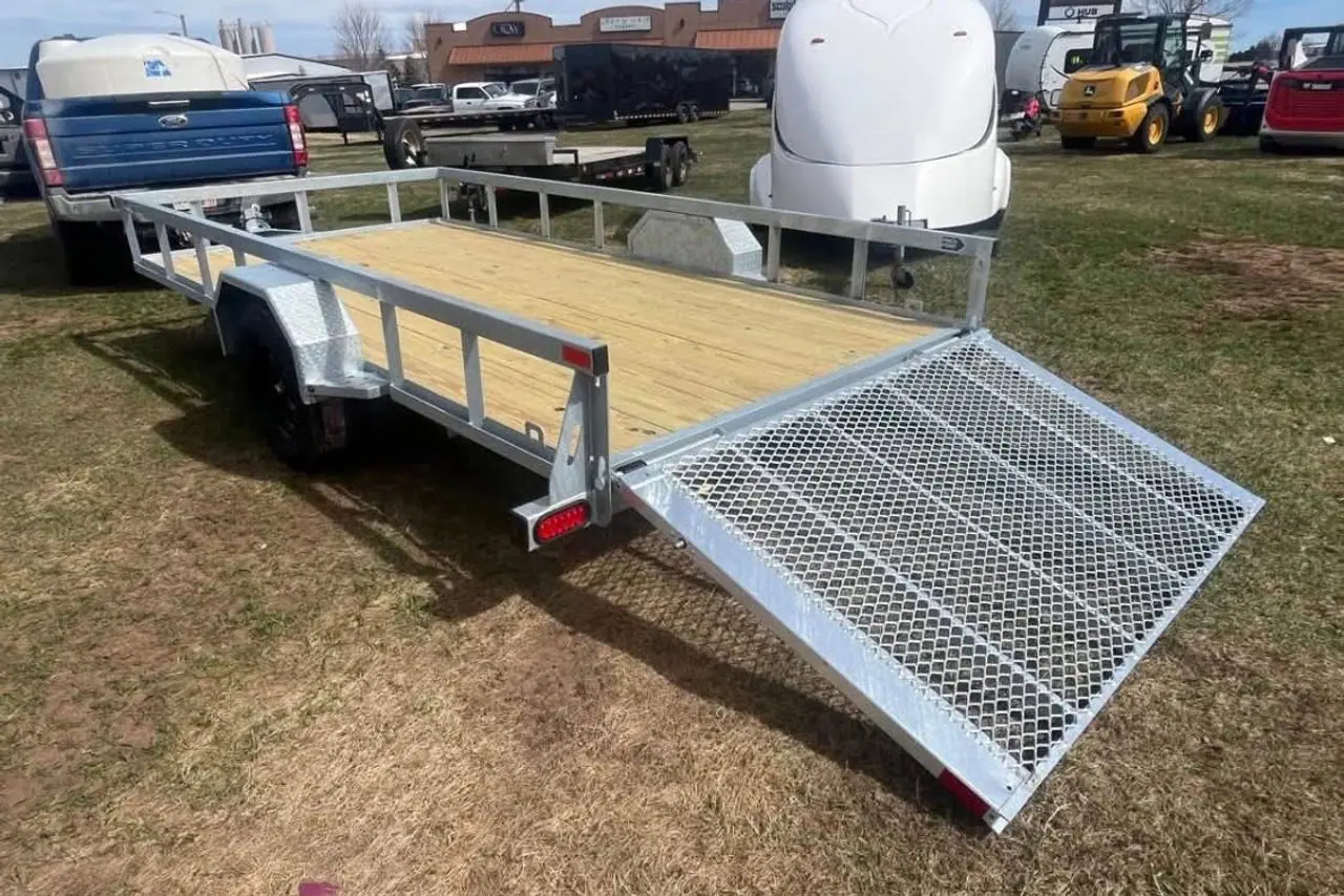 2027 Larson 14'x7' w/ Flip Down Ramp on the lot at Signature Auto Sales.