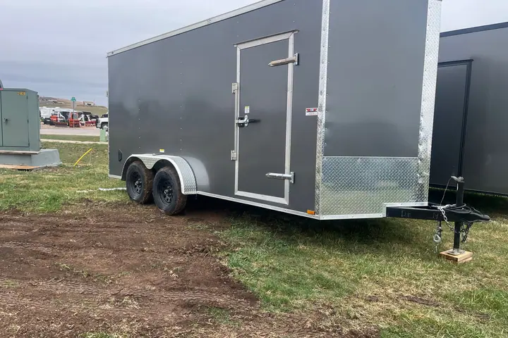 2026 Enclosed Cargo Trailer Extra Tall, 16x7, Rear Ramp, Poly Hail resistant on the lot at Signature Auto Sales.