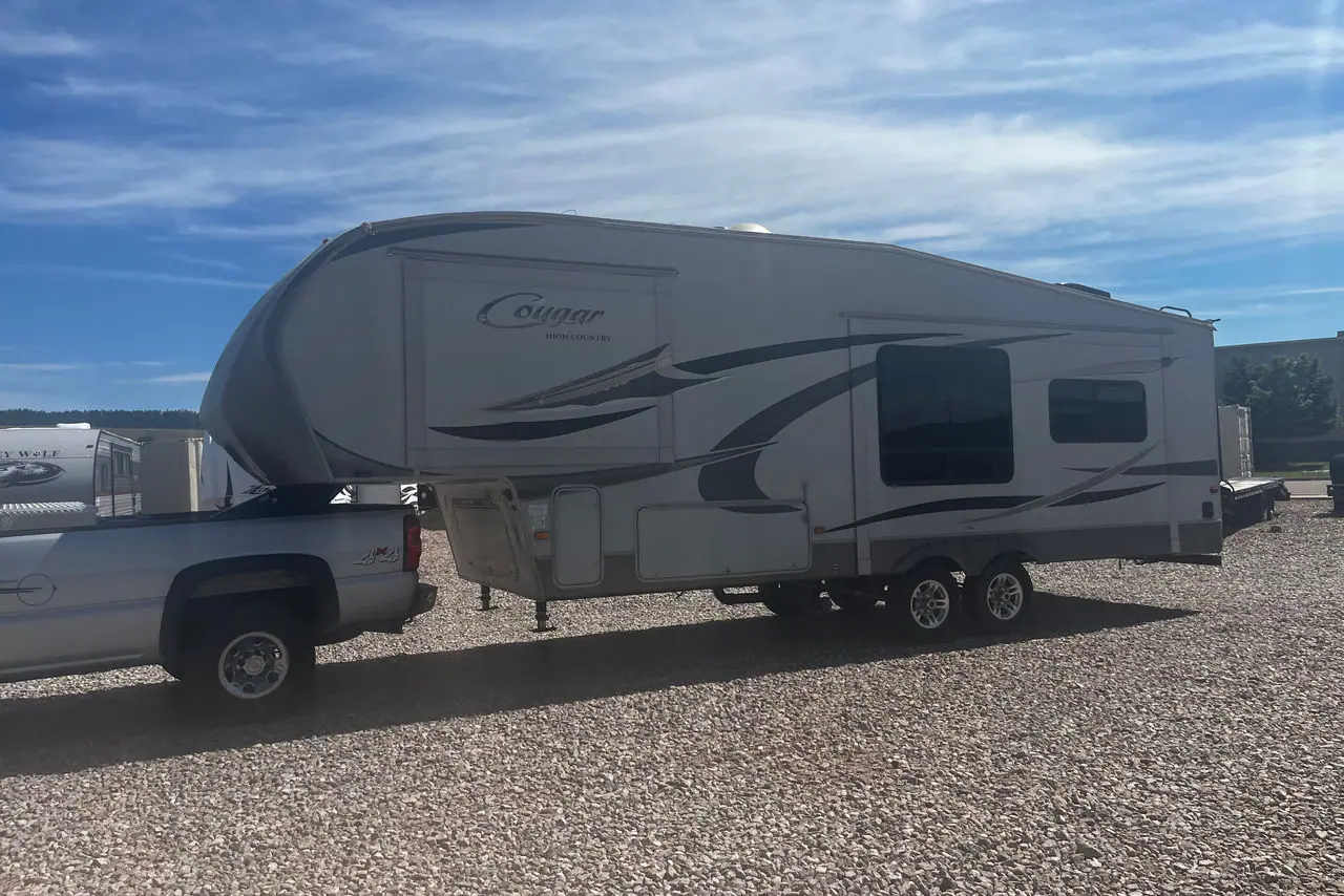 2010 Keystone Cougar 291RLS Fifth Wheel 2 slide outs on the lot at Signature Auto Sales.