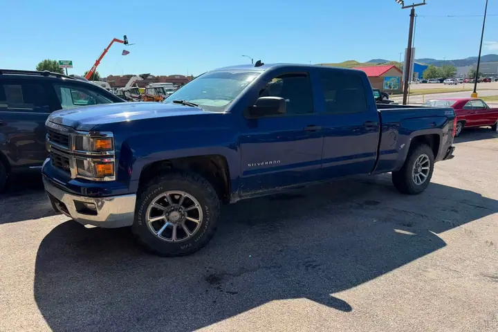 2014 Chevy Z71 1500 LT 4x4 on the lot at Signature Auto Sales.