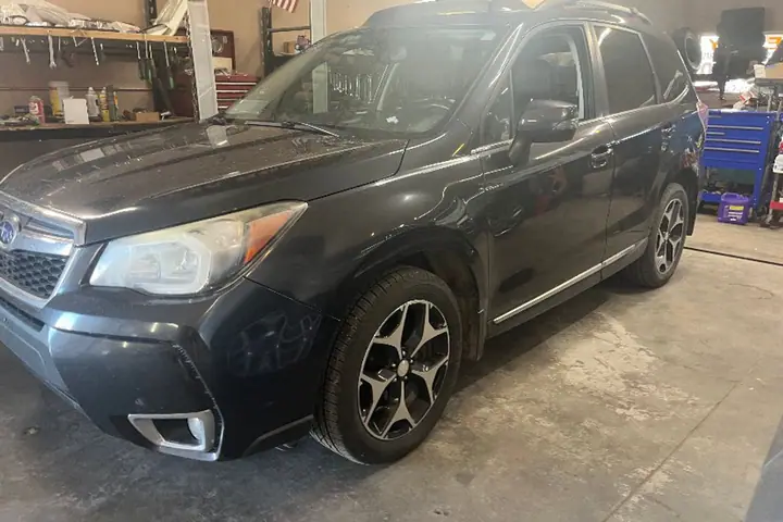 2015 Subaru Forrester AWD on the lot at Signature Auto Sales.