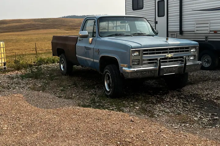 1987 Chevy 4x4 V8 Project Truck on the lot at Signature Auto Sales.