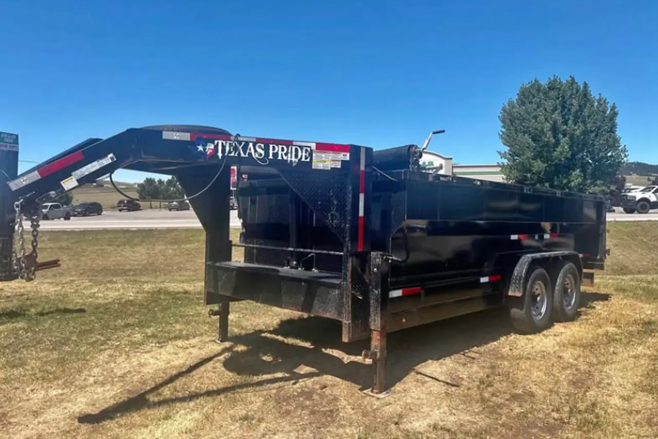 2024 Texas Pride 16' Dump Trailer Extra Tall, Extra wide sides on the lot at Signature Auto Sales.