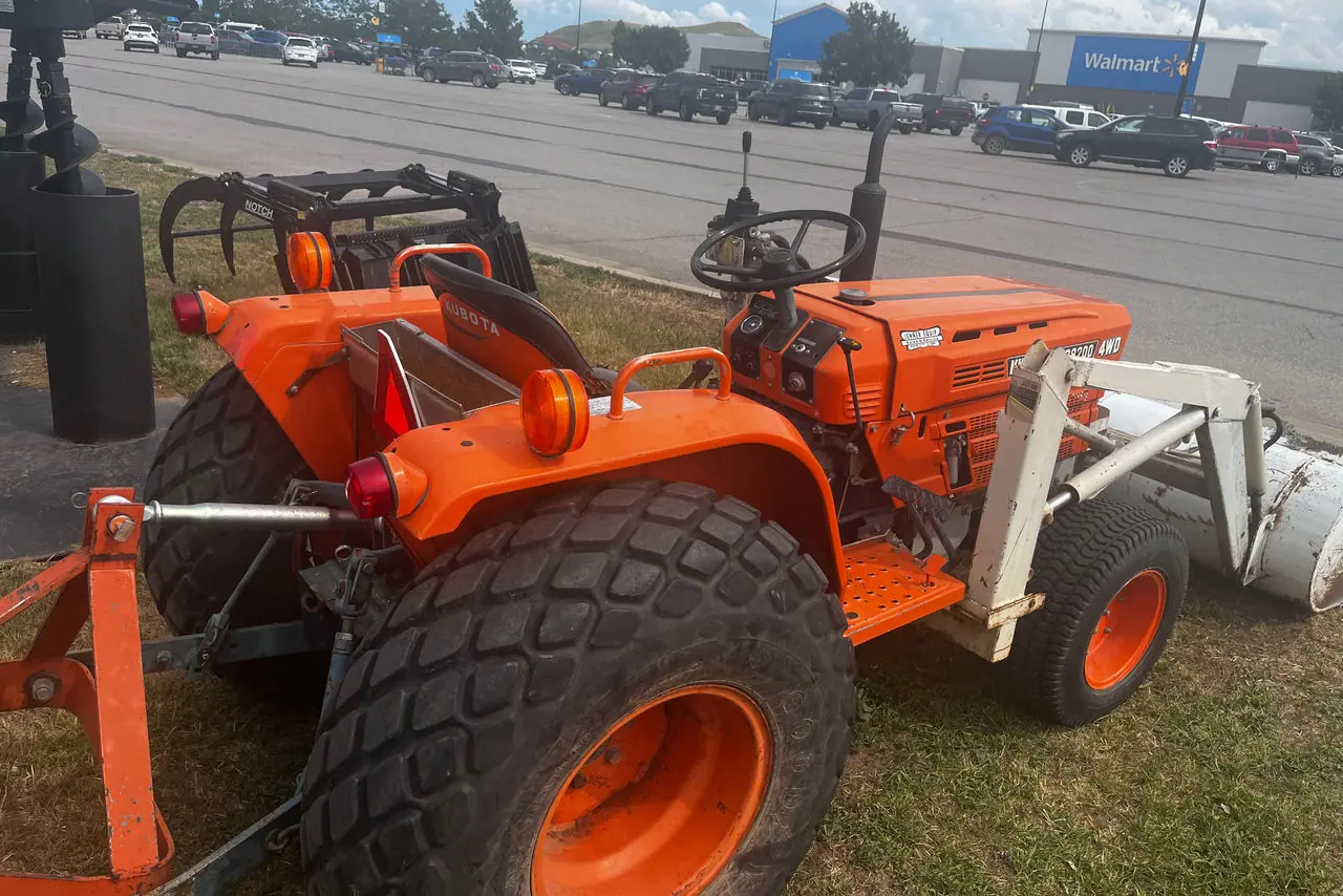 Kubota B8200 Tractor 4x5 Diesel Loader & Rear Blade on the lot at Signature Auto Sales.