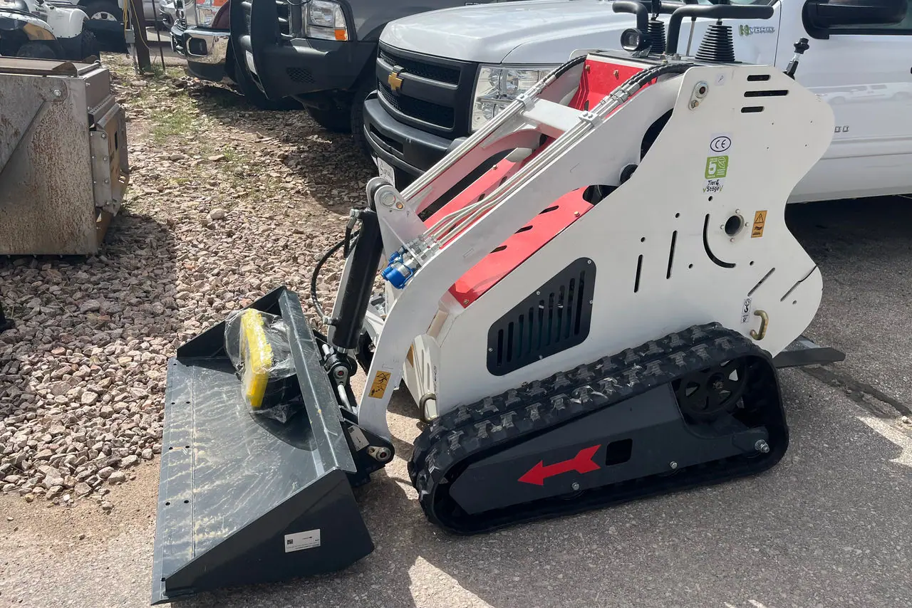 2026 Import Stand On Skid Steer Gas Engine Removable Bucket on the lot at Signature Auto Sales.