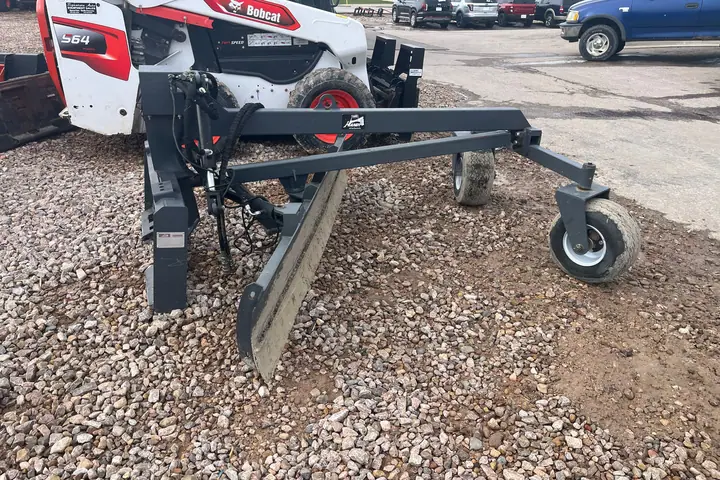 Skid Steer Grader Attachment 7' Universal Controls on the lot at Signature Auto Sales.