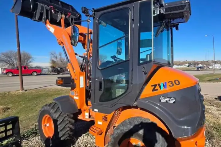 2023 Hitachi ZW30 on the lot at Signature Auto Sales.