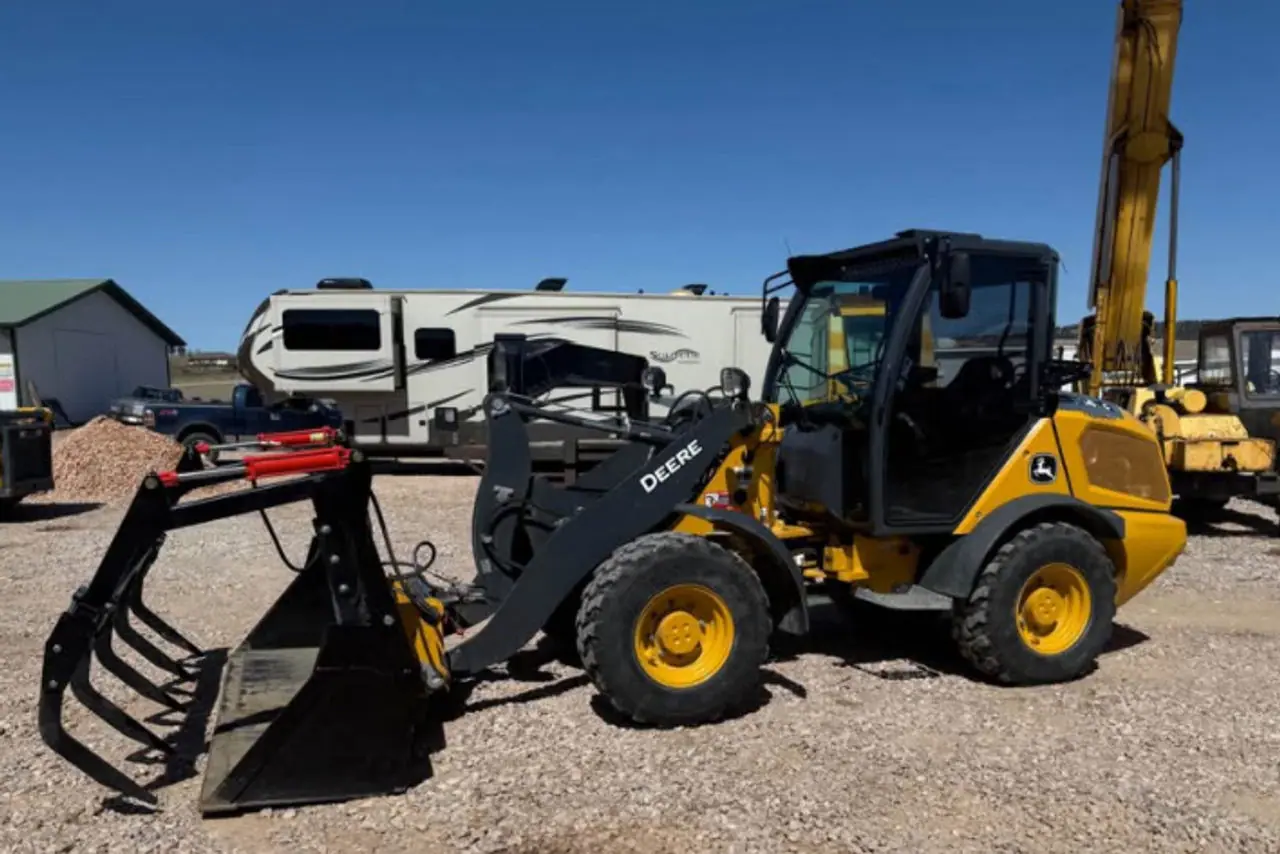 2024 John Deere 184G w/ Grapple on the lot at Signature Auto Sales.