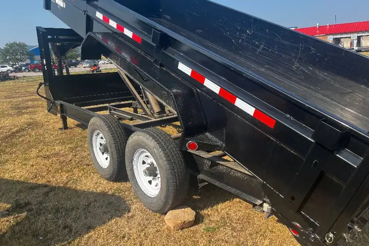 2014 PJ 16' Gooseneck Dump Trailer on the lot at Signature Auto Sales.
